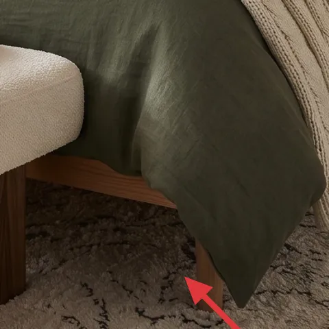 black-speckled area rug