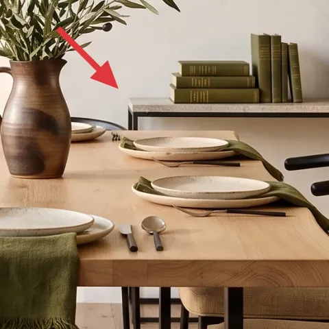 Ceramic vase with leafy stems