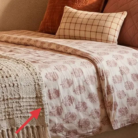 Cream knit throw with fringe