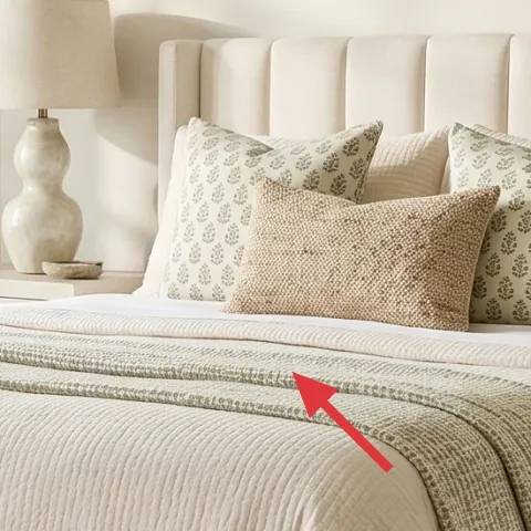green-and-cream throw blanket