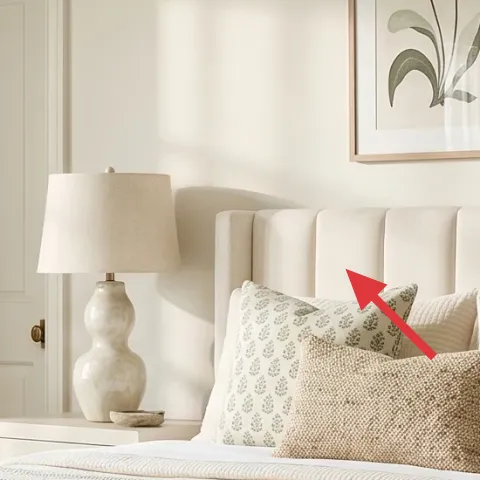 cream throw pillows with green pattern