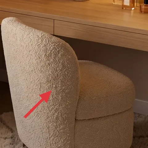 upholstered chair with rounded arms