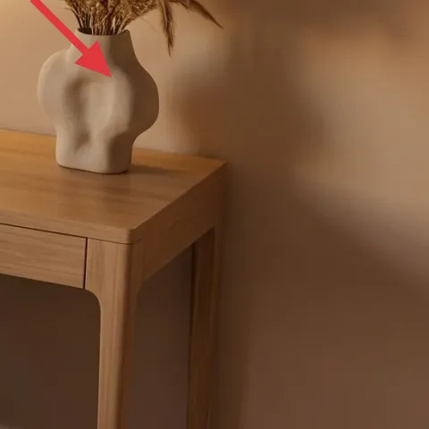 white vase with dried pampas grass